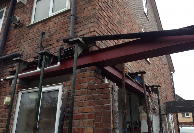 Girders in place wrap around extension crosby