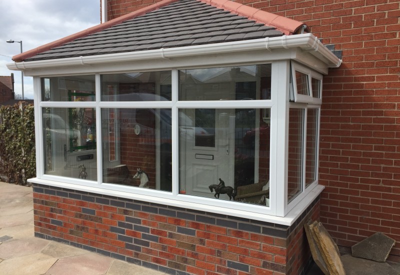 side image of porch with windows Bootle